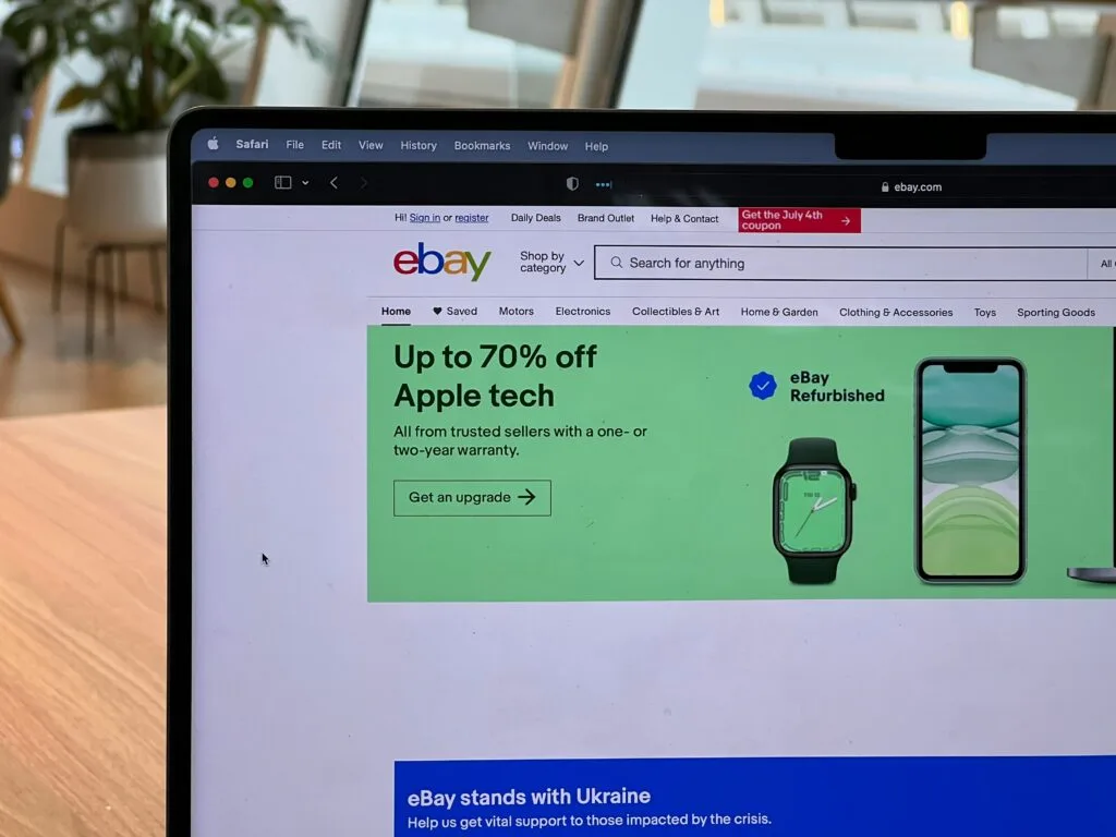 eBay site loaded on a laptop, reflecting changes in leadership and the impact on eCommerce alongside Shopify eco-tech advancements.