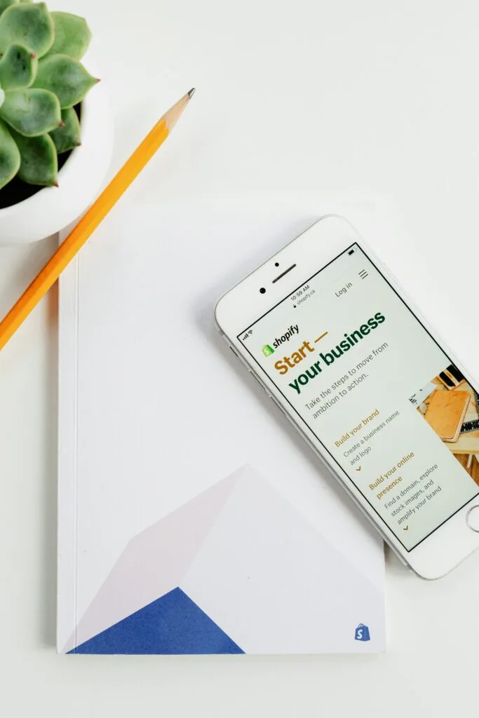 Shopify eco-tech innovations displayed on a smartphone screen, showcasing the platform's sustainability-focused features in eCommerce.
