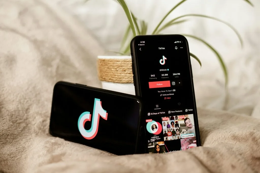 A smartphone displaying the TikTok app, showcasing engaging content that highlights products and brands. This image captures the essence of TikTok eCommerce marketing, emphasizing the platform's evolution from entertainment to a powerful tool for driving online sales and consumer engagement.