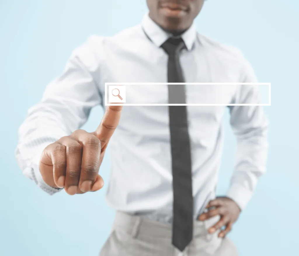 Businessman’s finger touching an empty search bar, symbolizing advanced Amazon eCommerce strategies and evolving consumer search behavior.