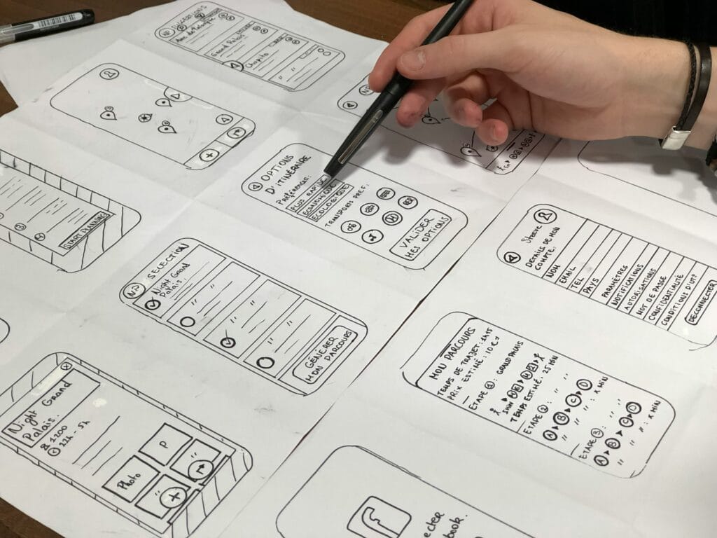 Image of somebody drawing UX design secrets for eCommerce for mobile