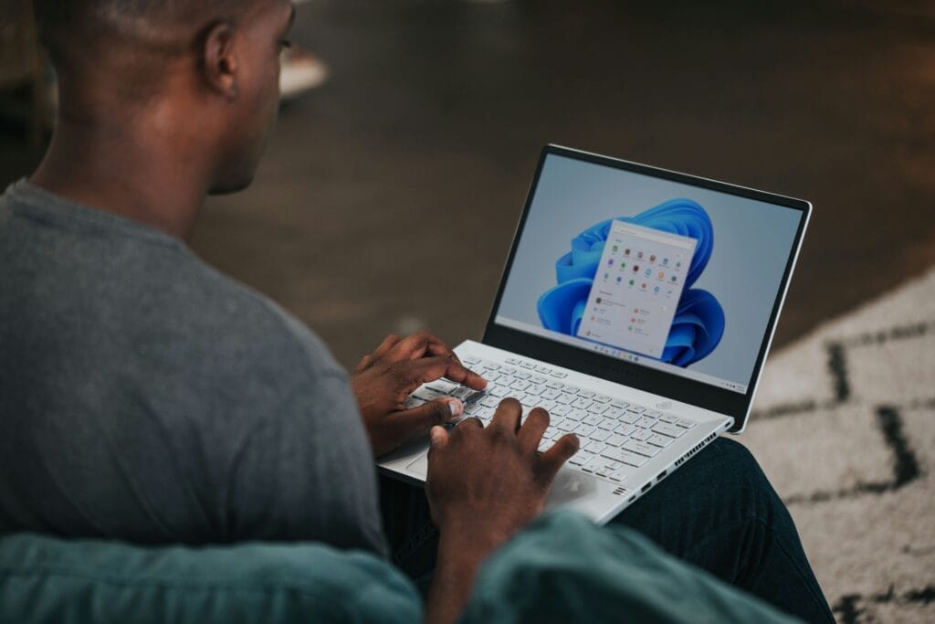 Image of person strategizing email upsell tactics to strengthen customer interactions