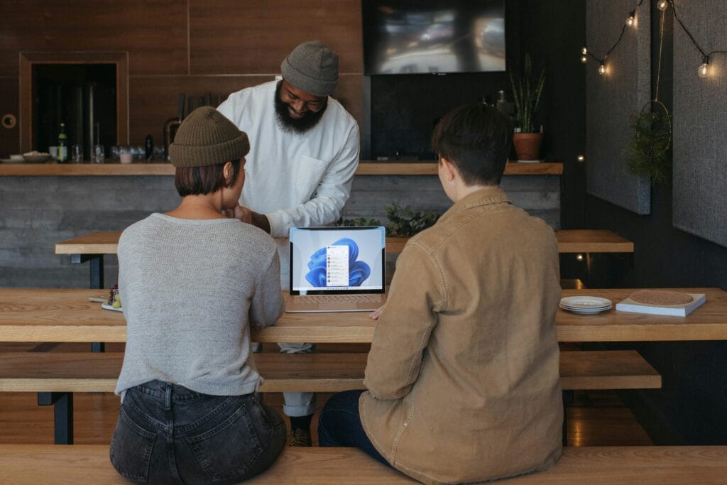 Team of people writing about UX design secrets for eCommerce