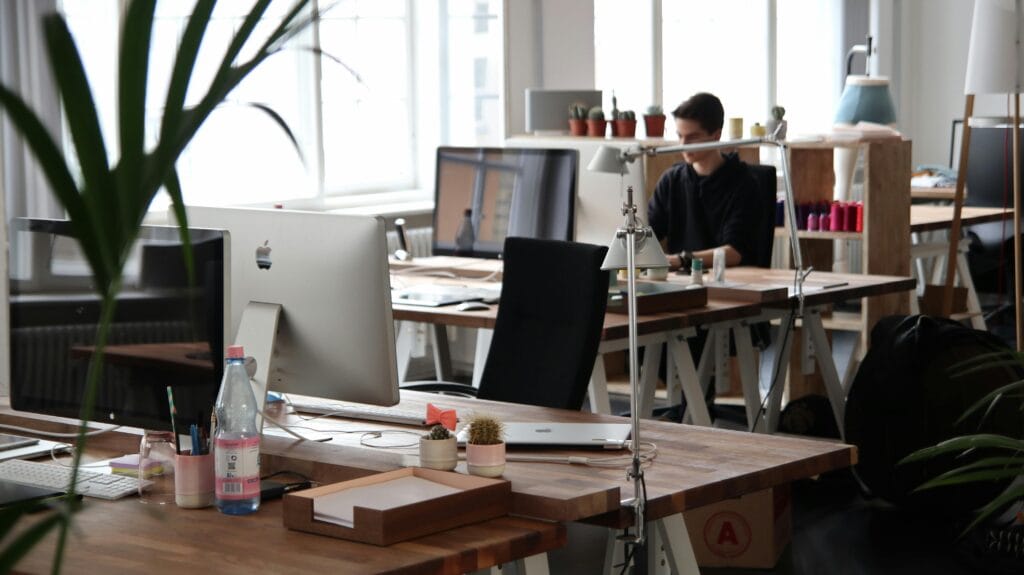 Image of person sitting in office working on customer segmentation for a client