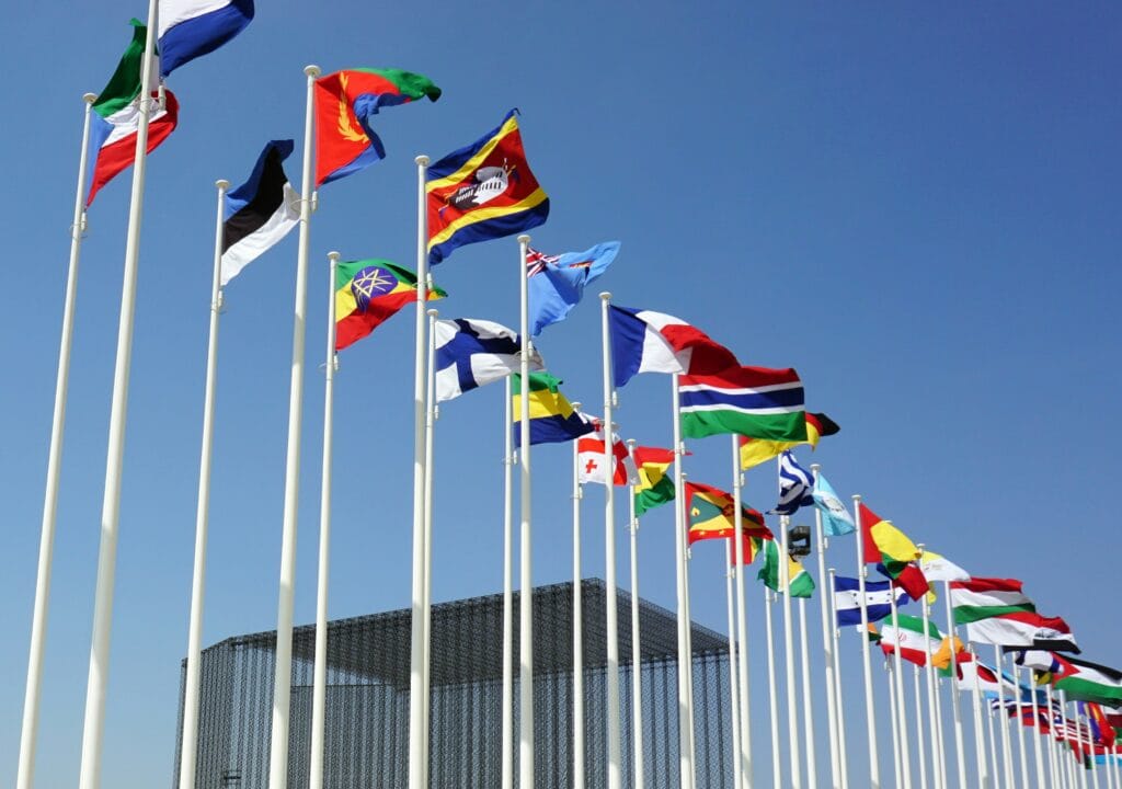 An image of flags to represent global partnerships and how they can influence Prime Day eCommerce Strategies for 2025