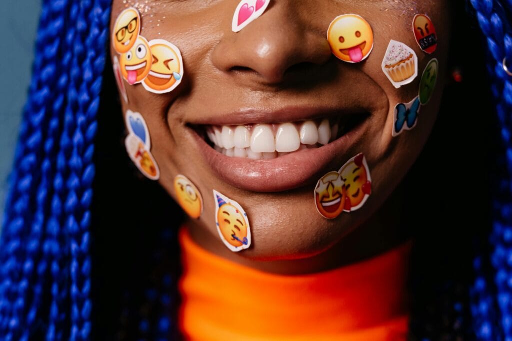 Image of a young woman with stickers on her face to illustrate Predictive Personalization in eCommerce