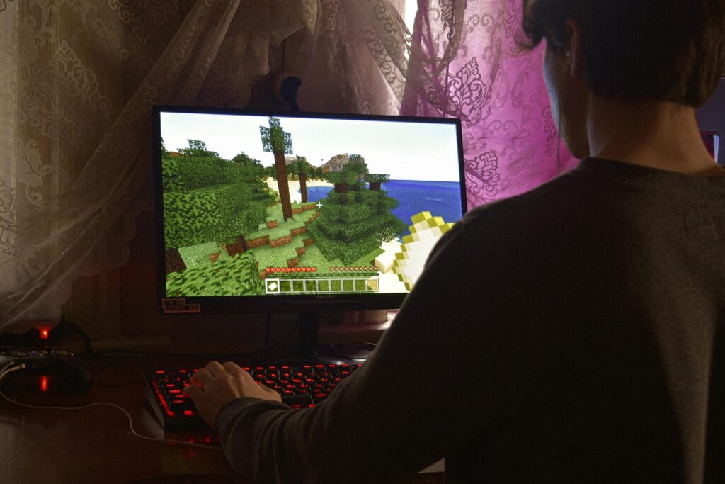 Person gaming on their computer signifying Gamification in Shopping Carts