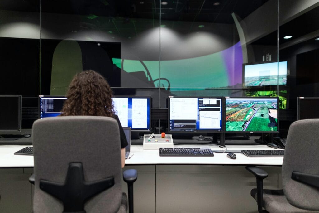 Image of woman analyzing data to work on the voice of the customer