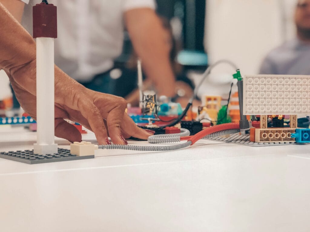 Person using lego to show Gamification in Shopping Carts as a driver for eCommerce growth