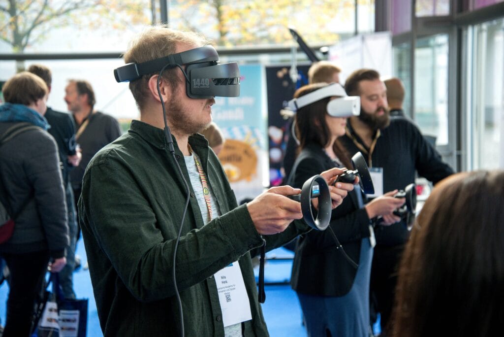 People using VR sets when online shopping which signifies Gamification in Shopping Carts