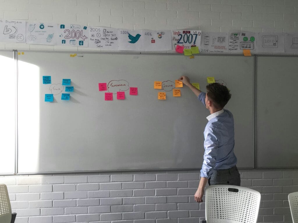 Image of person brainstorming ideas for order confirmation pages