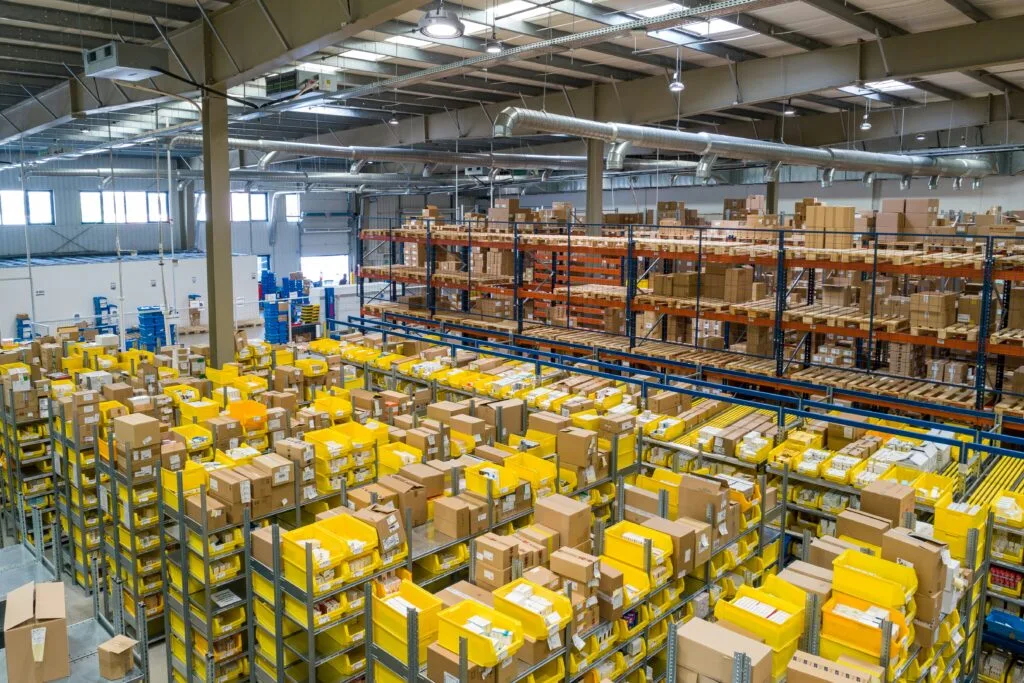 Image to demonstrate what good Order Confirmation Sales Boost strategies can lead to with an image of an Amazon warehouse